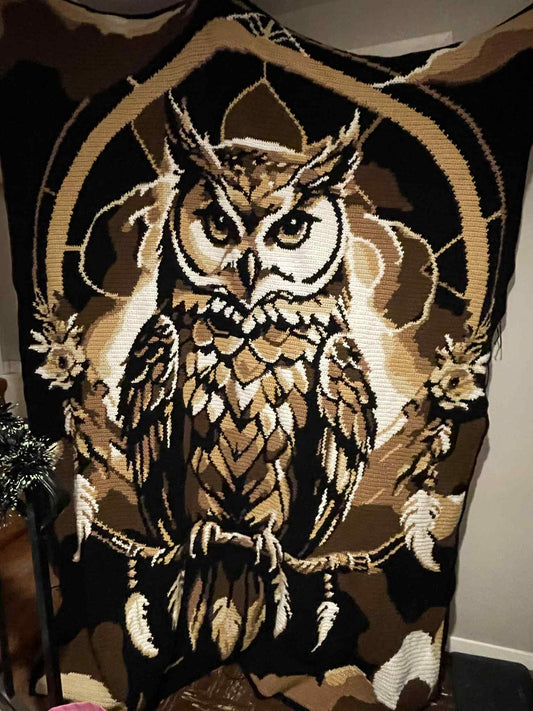 Decorative crochet graphghan blanket with an owl design on dreamcatcher motif. Design by Geeky Graphghans