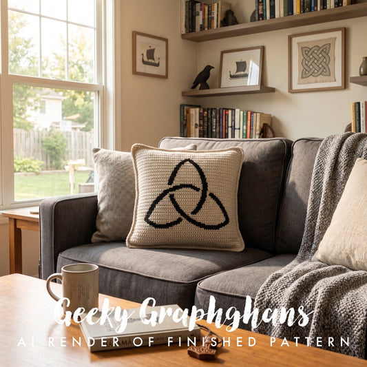 Gray sofa with a cushion featuring a Celtic knot design, surrounded by books and decor in a cozy room. Geeky Graphghan Crochet pillow patern