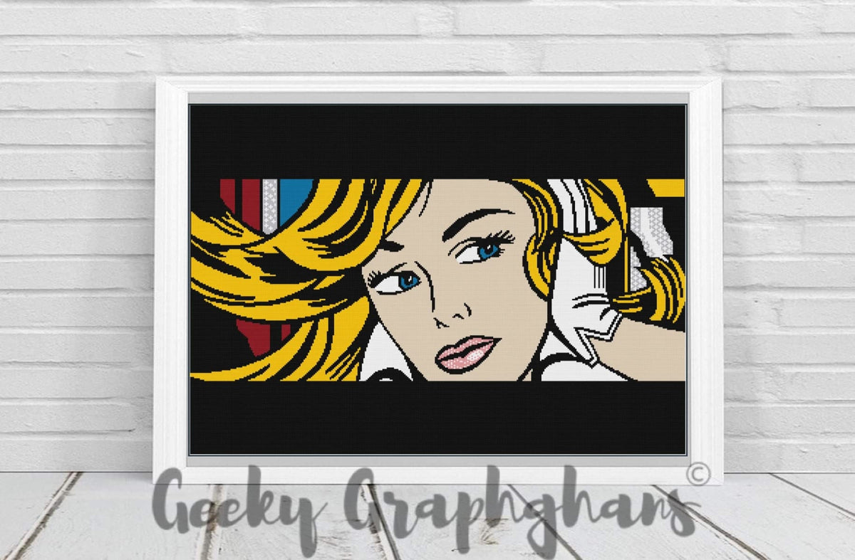 A crochet pattern display featuring a colorful graphic design with a pop art style, framed in a white border, with the brand name 'Geeky Graphghans' written in a script typewriter font.