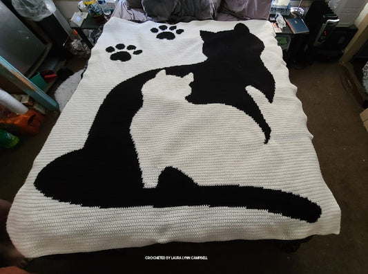 crochet graphghan of two cats silhouettes