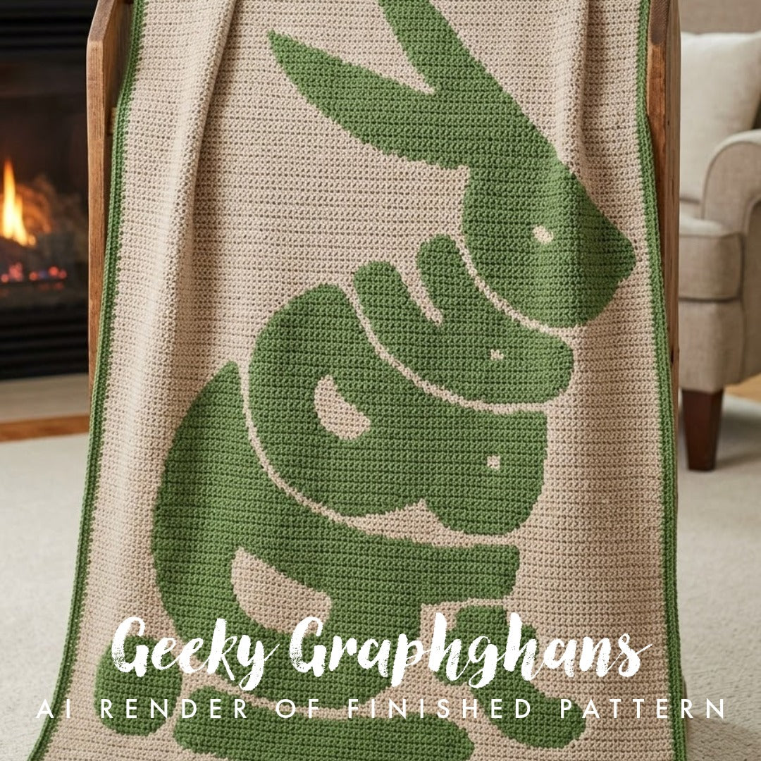 Crocheted blanket with green bunny design draped over a chair in a cozy room.
