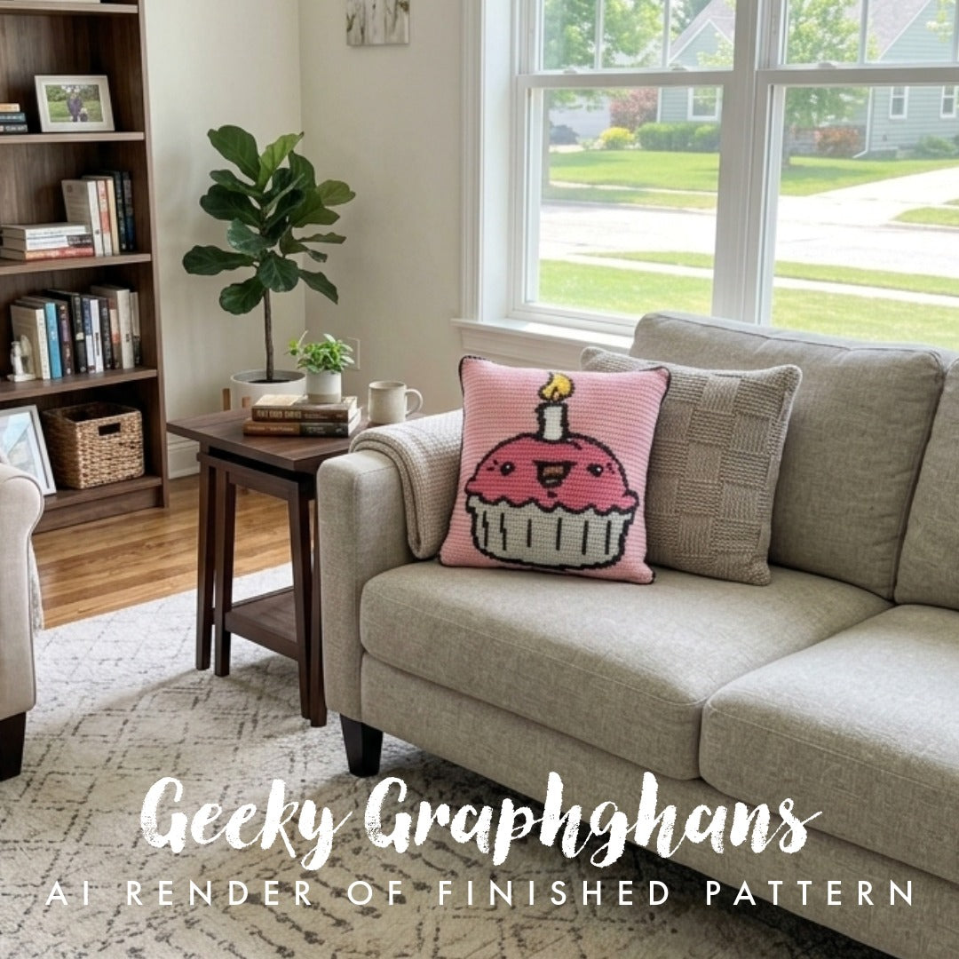 Living room with a couch featuring a decorative pillow and 'Geeky Graphghans' branding.