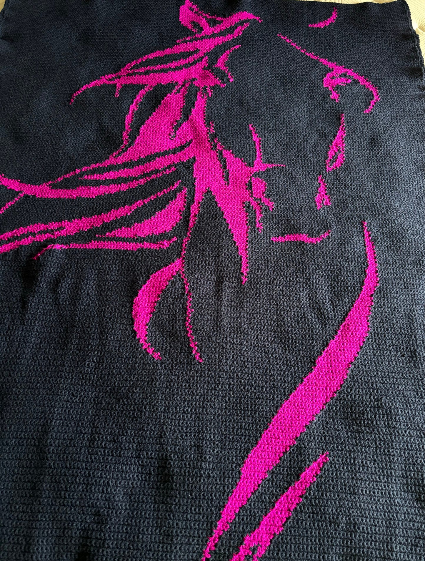Black fabric with pink horse design