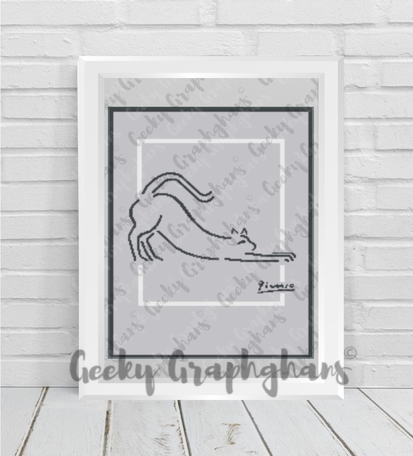 Cat sketch by Pablo Picasso. Crochet Graphghan. Framed black and white drawing of a cat on a textured wall with 'Geeky Graphghans' branding.
