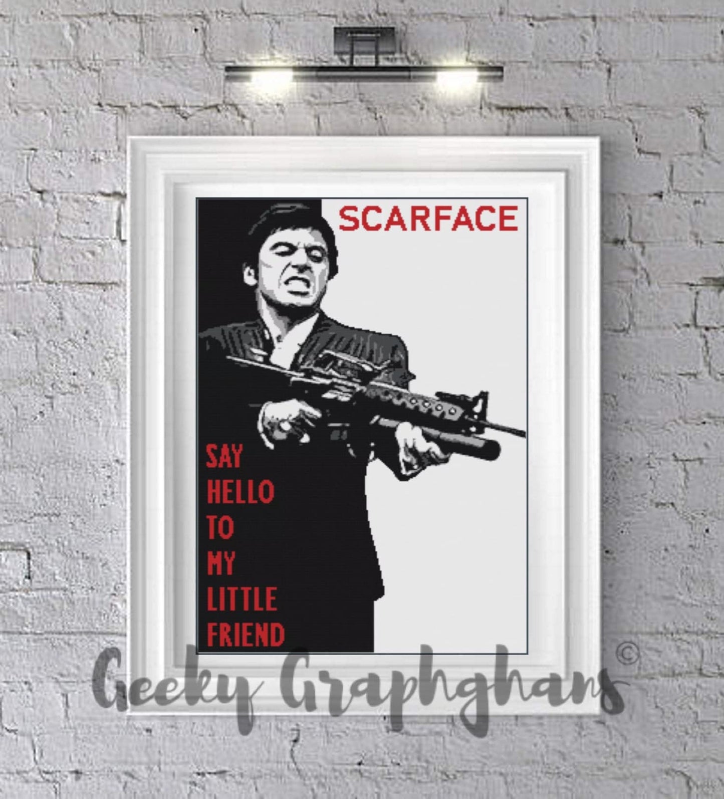 A crochet graphghan pattern display featuring a black and white image of Al Pacino from the movie 'Scarface' on the cover, with the text 'Say hello to my little friend' below it.