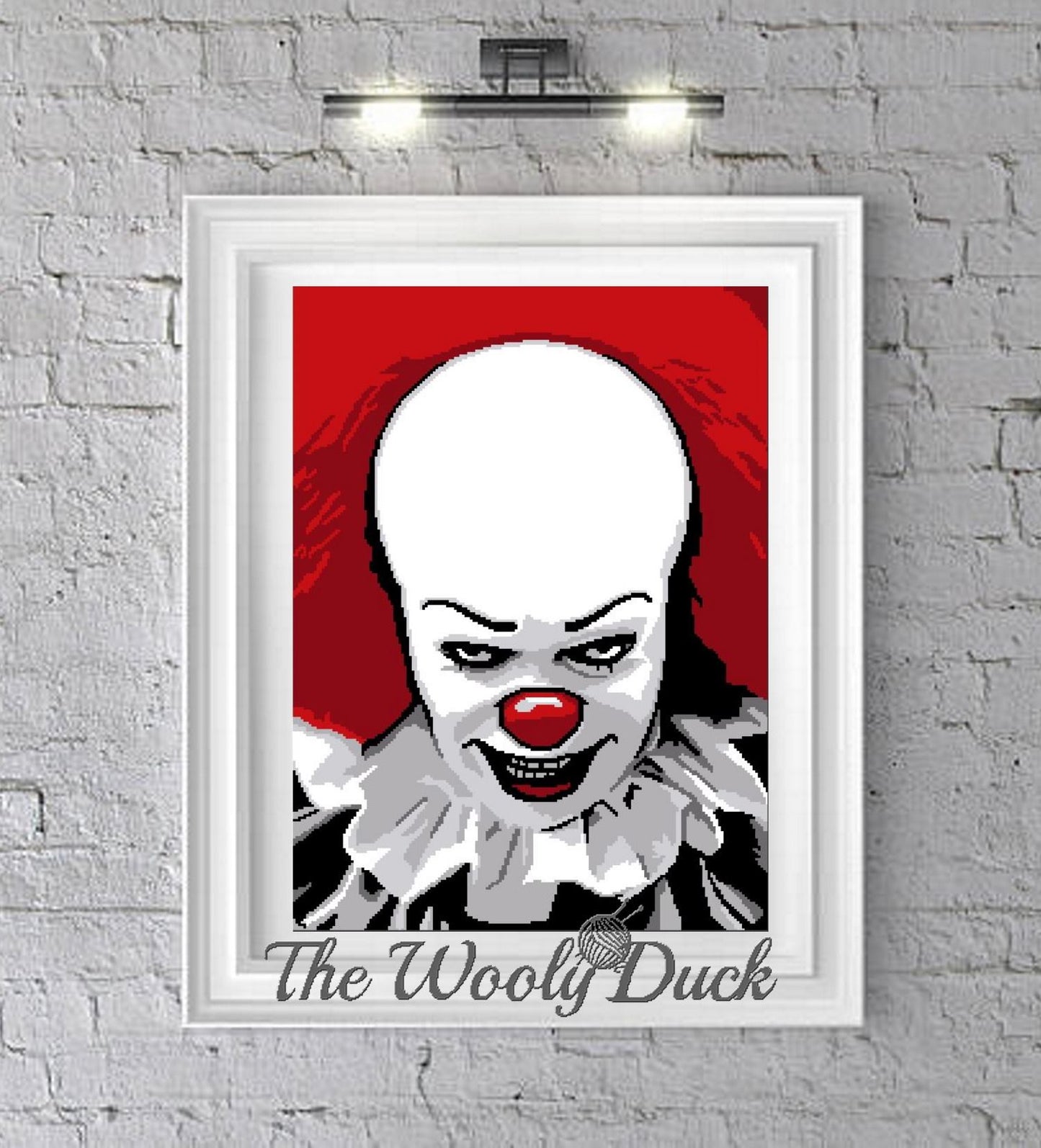 Crochet pattern graphic displayed in a frame, featuring an illustration of Pennywise the Dancing Clown from the horror novel 'It' by Stephen King.